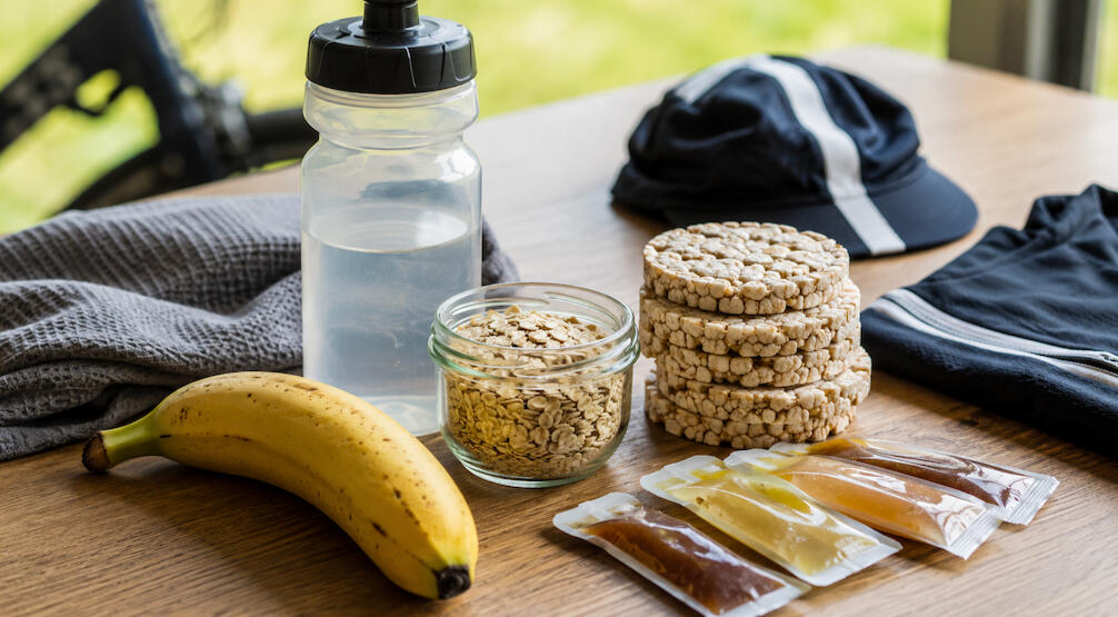 Cycling fuelling image showing simple carbohydrate and protein foods used to support training and recovery.
